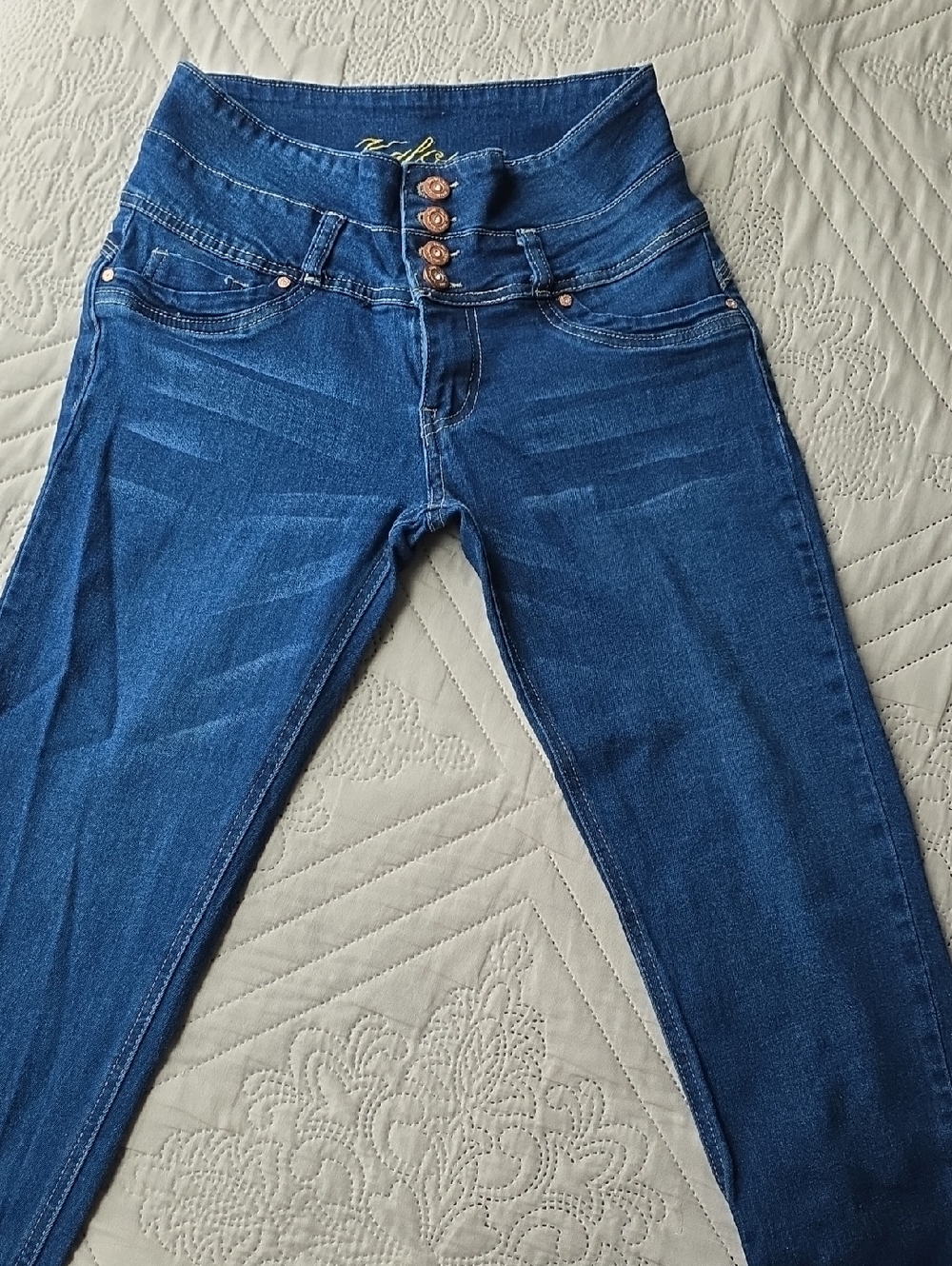 High-Rise Skinny Jeans in Deep Blue with Triple Button Waist